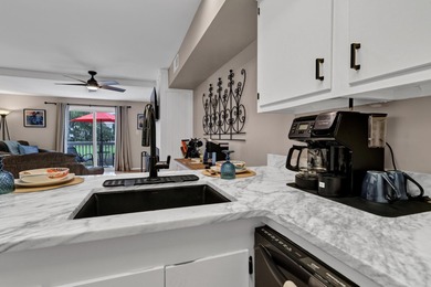 This desirable first-floor Driftwood villa offers easy access on The Plantation Course At Edisto in South Carolina - for sale on GolfHomes.com, golf home, golf lot