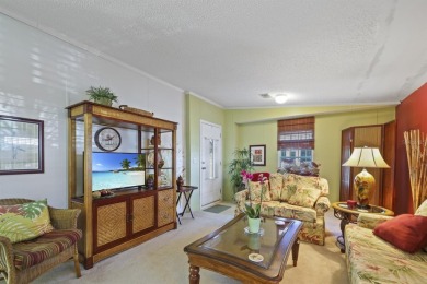 Move in ready and just waiting for your own personal touch. This on Maple Leaf Golf and Country Club in Florida - for sale on GolfHomes.com, golf home, golf lot