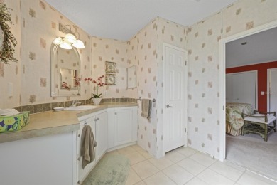 Move in ready and just waiting for your own personal touch. This on Maple Leaf Golf and Country Club in Florida - for sale on GolfHomes.com, golf home, golf lot