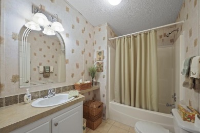 Move in ready and just waiting for your own personal touch. This on Maple Leaf Golf and Country Club in Florida - for sale on GolfHomes.com, golf home, golf lot