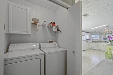 Move in ready and just waiting for your own personal touch. This on Maple Leaf Golf and Country Club in Florida - for sale on GolfHomes.com, golf home, golf lot