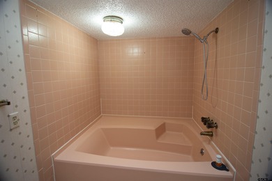 Lakefront classic! Brick ranch style home is ready for on Holly Lake Ranch Golf Club in Texas - for sale on GolfHomes.com, golf home, golf lot