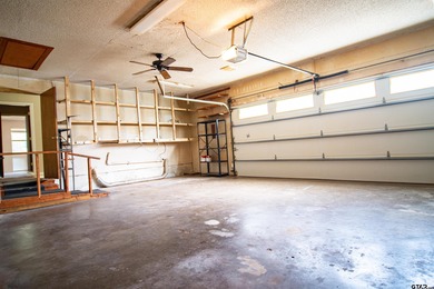 Lakefront classic! Brick ranch style home is ready for on Holly Lake Ranch Golf Club in Texas - for sale on GolfHomes.com, golf home, golf lot