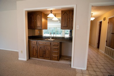 Lakefront classic! Brick ranch style home is ready for on Holly Lake Ranch Golf Club in Texas - for sale on GolfHomes.com, golf home, golf lot