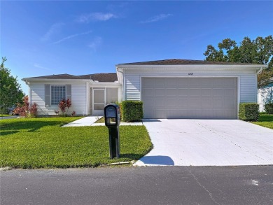 LIGHT, BRIGHT AND OPEN!! This spacious two bedroom + flex space on Tampa Bay Golf and Country Club in Florida - for sale on GolfHomes.com, golf home, golf lot