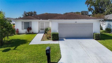 LIGHT, BRIGHT AND OPEN!! This spacious two bedroom + flex space on Tampa Bay Golf and Country Club in Florida - for sale on GolfHomes.com, golf home, golf lot