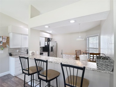 LIGHT, BRIGHT AND OPEN!! This spacious two bedroom + flex space on Tampa Bay Golf and Country Club in Florida - for sale on GolfHomes.com, golf home, golf lot