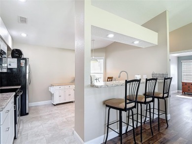 LIGHT, BRIGHT AND OPEN!! This spacious two bedroom + flex space on Tampa Bay Golf and Country Club in Florida - for sale on GolfHomes.com, golf home, golf lot