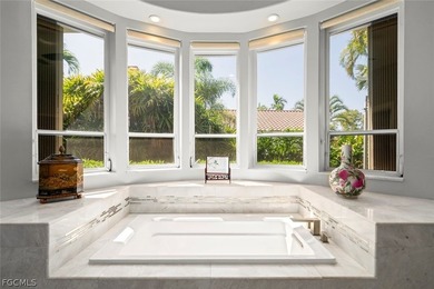 This custom contemporary classic is a truly remarkable offering on Fiddlesticks Country Club in Florida - for sale on GolfHomes.com, golf home, golf lot