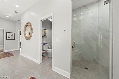 This custom contemporary classic is a truly remarkable offering on Fiddlesticks Country Club in Florida - for sale on GolfHomes.com, golf home, golf lot