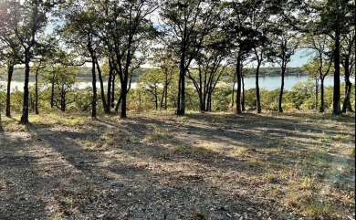 Almost 1 acre undeveloped build site with breathtaking views of on Nocona Hills Golf Course in Texas - for sale on GolfHomes.com, golf home, golf lot