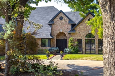 Take up this beautiful home located on the west side of Oak Tree on Oak Tree National Golf and Country Club in Oklahoma - for sale on GolfHomes.com, golf home, golf lot