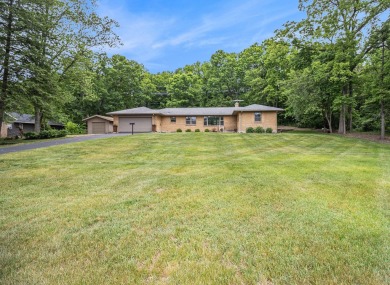 Welcome to 6667 W River Drive NE in Belmont, Michigan--a on Blythefield Country Club in Michigan - for sale on GolfHomes.com, golf home, golf lot
