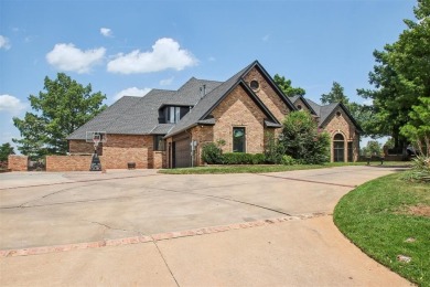 Take up this beautiful home located on the west side of Oak Tree on Oak Tree National Golf and Country Club in Oklahoma - for sale on GolfHomes.com, golf home, golf lot