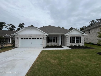Ready Now! This beautiful new home in Palmetto Creek has a pond on Lennon Hills Golf Course in North Carolina - for sale on GolfHomes.com, golf home, golf lot