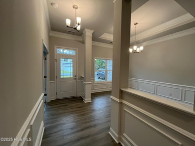 Ready Now! This beautiful new home in Palmetto Creek has a pond on Lennon Hills Golf Course in North Carolina - for sale on GolfHomes.com, golf home, golf lot