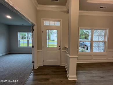 Ready Now! This beautiful new home in Palmetto Creek has a pond on Lennon Hills Golf Course in North Carolina - for sale on GolfHomes.com, golf home, golf lot