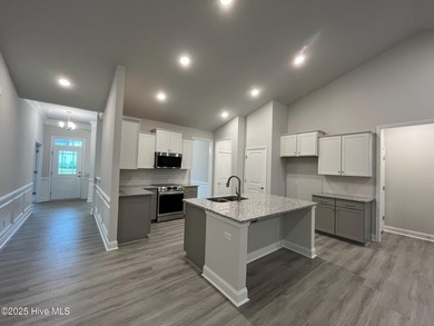 Ready Now! This beautiful new home in Palmetto Creek has a pond on Lennon Hills Golf Course in North Carolina - for sale on GolfHomes.com, golf home, golf lot