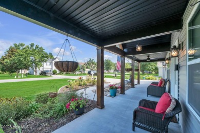 Welcome to Eagle Creek in Moyock, NC! This beautifully updated on Eagle Creek Golf Club and Grill in North Carolina - for sale on GolfHomes.com, golf home, golf lot