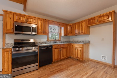 This beautifully updated, 4-bathroom and 3 bedrooms with another on White Path Golf Club in Georgia - for sale on GolfHomes.com, golf home, golf lot