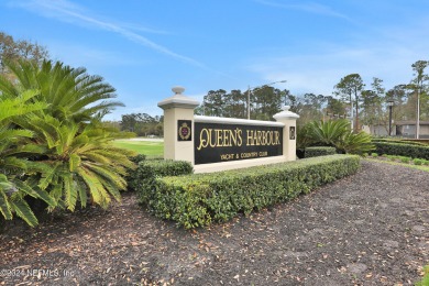 Experience the epitome of Florida elegance in this deluxe on Queens Harbour Yacht and Country Club in Florida - for sale on GolfHomes.com, golf home, golf lot