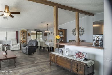 Enjoy the best of Arizona living in this updated 2-bedroom on Fountain of the Sun Country Club in Arizona - for sale on GolfHomes.com, golf home, golf lot
