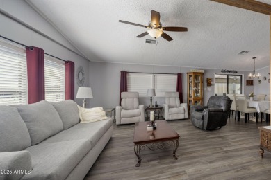 Enjoy the best of Arizona living in this updated 2-bedroom on Fountain of the Sun Country Club in Arizona - for sale on GolfHomes.com, golf home, golf lot