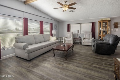 Enjoy the best of Arizona living in this updated 2-bedroom on Fountain of the Sun Country Club in Arizona - for sale on GolfHomes.com, golf home, golf lot
