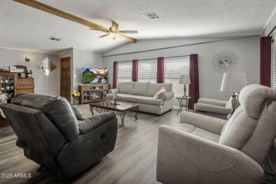 Enjoy the best of Arizona living in this updated 2-bedroom on Fountain of the Sun Country Club in Arizona - for sale on GolfHomes.com, golf home, golf lot