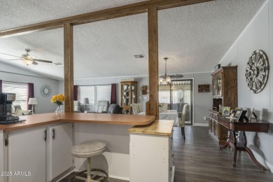 Enjoy the best of Arizona living in this updated 2-bedroom on Fountain of the Sun Country Club in Arizona - for sale on GolfHomes.com, golf home, golf lot