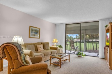 Beautiful 2 bed 2 bath unit in The Palms of Deer Creek located on Deer Creek Golf Club in Florida - for sale on GolfHomes.com, golf home, golf lot