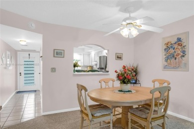 Beautiful 2 bed 2 bath unit in The Palms of Deer Creek located on Deer Creek Golf Club in Florida - for sale on GolfHomes.com, golf home, golf lot