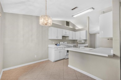 This single-family home is situated in the desirable Cypress on The Grand Club Cypress Course in Florida - for sale on GolfHomes.com, golf home, golf lot