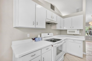 This single-family home is situated in the desirable Cypress on The Grand Club Cypress Course in Florida - for sale on GolfHomes.com, golf home, golf lot