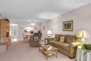 Beautiful 2 bed 2 bath unit in The Palms of Deer Creek located on Deer Creek Golf Club in Florida - for sale on GolfHomes.com, golf home, golf lot