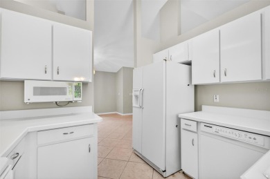 This single-family home is situated in the desirable Cypress on The Grand Club Cypress Course in Florida - for sale on GolfHomes.com, golf home, golf lot