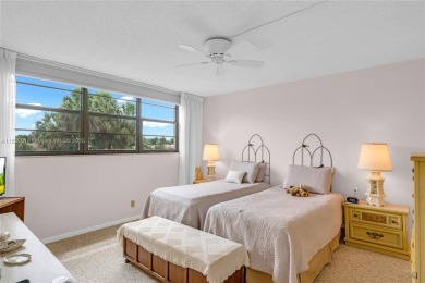 Beautiful 2 bed 2 bath unit in The Palms of Deer Creek located on Deer Creek Golf Club in Florida - for sale on GolfHomes.com, golf home, golf lot