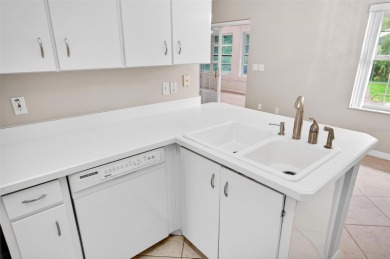 This single-family home is situated in the desirable Cypress on The Grand Club Cypress Course in Florida - for sale on GolfHomes.com, golf home, golf lot