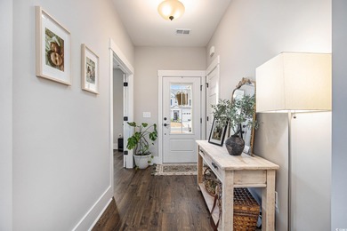 This stunning 4 bed 3 bath home located in the highly sought on World Tour Golf Links in South Carolina - for sale on GolfHomes.com, golf home, golf lot