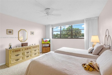 Beautiful 2 bed 2 bath unit in The Palms of Deer Creek located on Deer Creek Golf Club in Florida - for sale on GolfHomes.com, golf home, golf lot