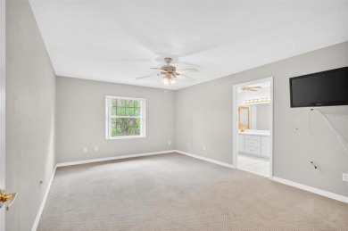 This single-family home is situated in the desirable Cypress on The Grand Club Cypress Course in Florida - for sale on GolfHomes.com, golf home, golf lot