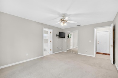 This single-family home is situated in the desirable Cypress on The Grand Club Cypress Course in Florida - for sale on GolfHomes.com, golf home, golf lot