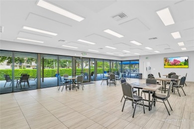 Beautiful 2 bed 2 bath unit in The Palms of Deer Creek located on Deer Creek Golf Club in Florida - for sale on GolfHomes.com, golf home, golf lot