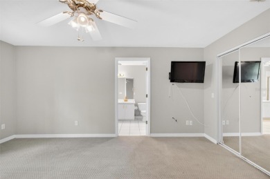 This single-family home is situated in the desirable Cypress on The Grand Club Cypress Course in Florida - for sale on GolfHomes.com, golf home, golf lot