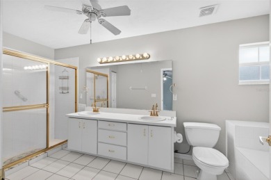 This single-family home is situated in the desirable Cypress on The Grand Club Cypress Course in Florida - for sale on GolfHomes.com, golf home, golf lot