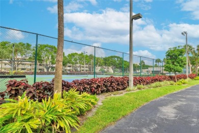 Beautiful 2 bed 2 bath unit in The Palms of Deer Creek located on Deer Creek Golf Club in Florida - for sale on GolfHomes.com, golf home, golf lot