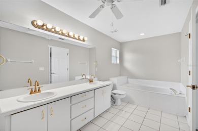 This single-family home is situated in the desirable Cypress on The Grand Club Cypress Course in Florida - for sale on GolfHomes.com, golf home, golf lot