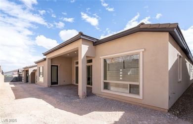 Welcome to this stunning "Journey" single-story home on Reflection Bay Golf Club in Nevada - for sale on GolfHomes.com, golf home, golf lot