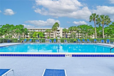 Beautiful 2 bed 2 bath unit in The Palms of Deer Creek located on Deer Creek Golf Club in Florida - for sale on GolfHomes.com, golf home, golf lot