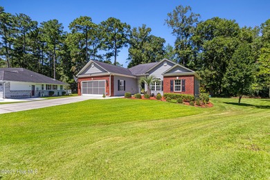 EXCEPTIONAL IS THE WORD! This pristine home is tucked away on a on Carolina Shores Golf Course in North Carolina - for sale on GolfHomes.com, golf home, golf lot